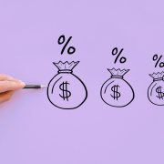 Image of drawing of bags of money getting smaller as a person is paying interest in advance