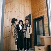 Friends looking at properties together