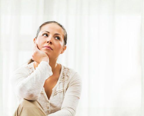 Woman dreaming of the perfect home