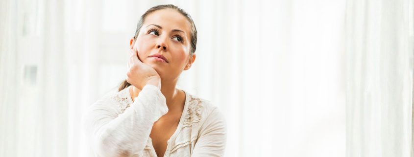 Woman dreaming of the perfect home